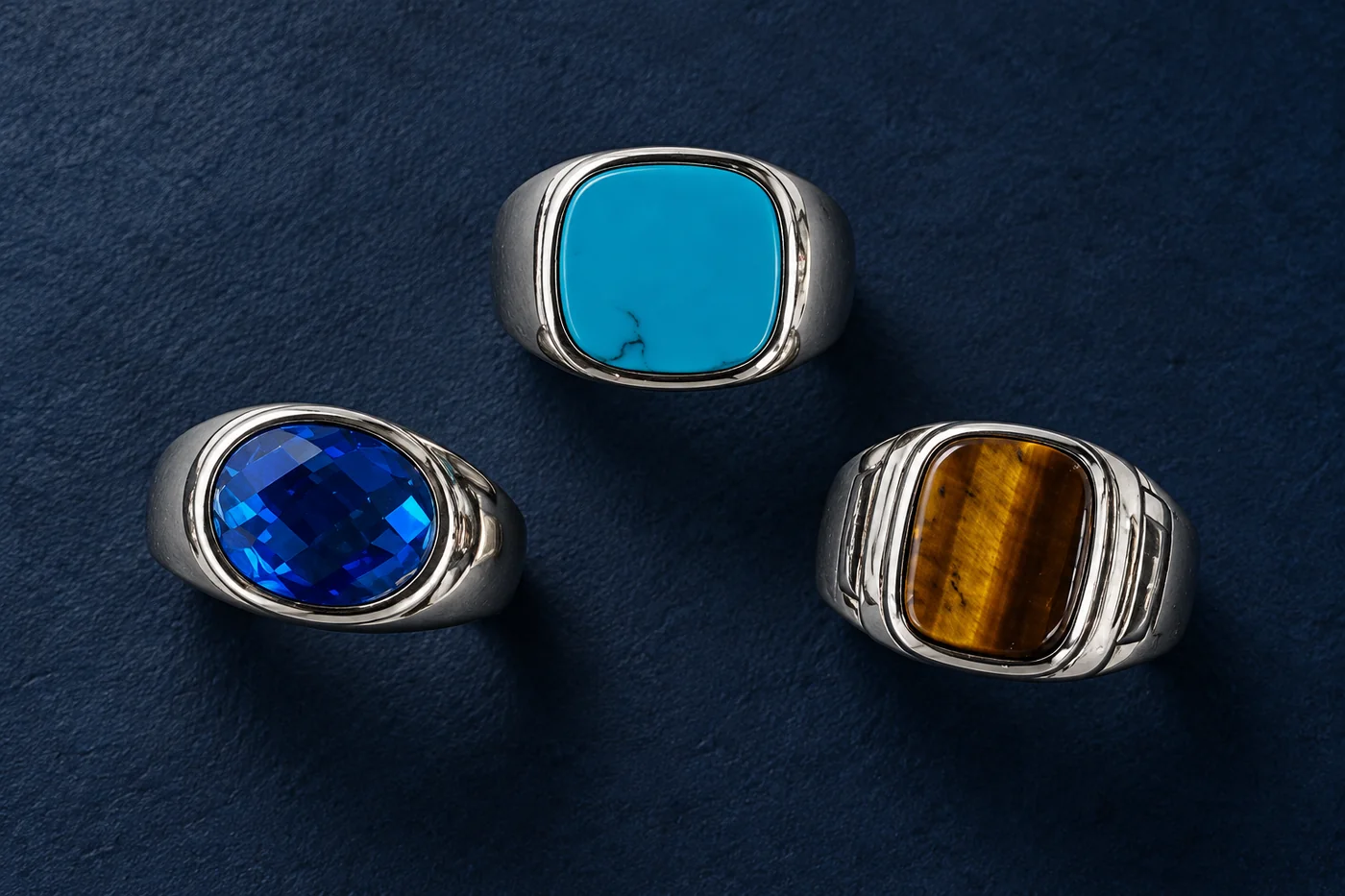 Several cast signet rings with different head geometries