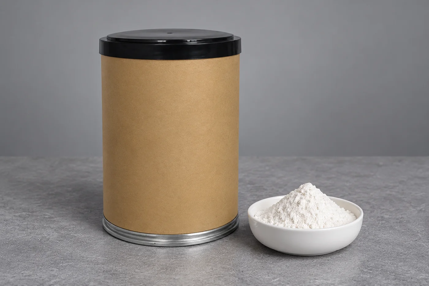 Plain investment-powder container with a small unmarked sample dish